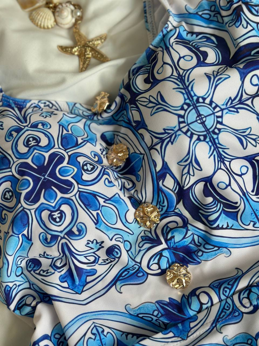 Суцільний блакитний купальник з спідничкою